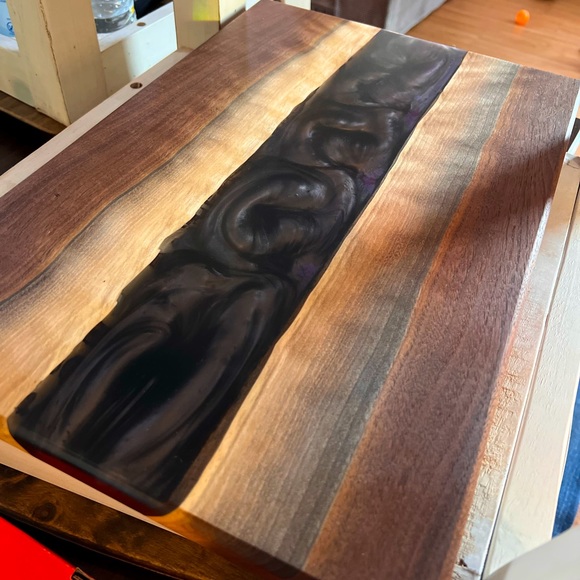 Epoxy and walnut river cutting board.